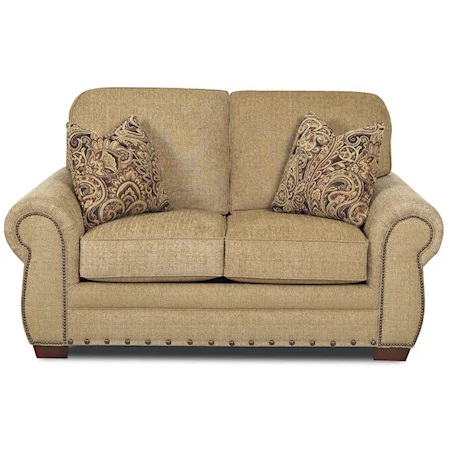 Traditional Loveseat with Rolled Arms and Nail Head Trim
